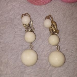 Vintage milk glass clip on earrings.